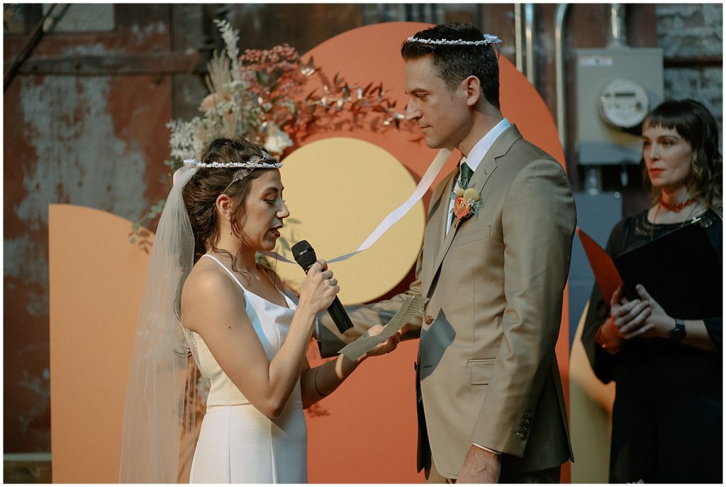 Nora and Steve exchange vows during a wedding ceremony at Dandy Milwaukee.
