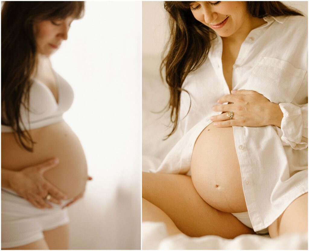 A pregnant woman in a white button down shirt poses for pregnancy photography in her bedroom.