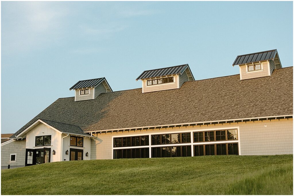 The Carriage House at the Club at Lac La Belle sits on a hill.