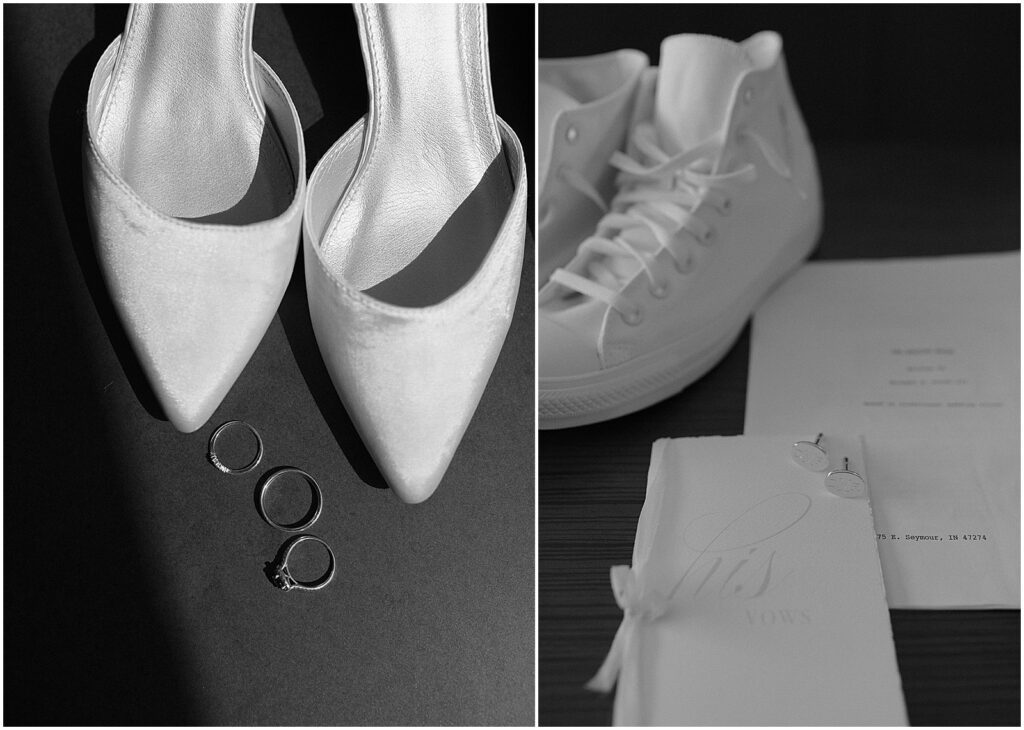 White wedding shoes sit beside wedding jewelry in a black and white wedding photo.