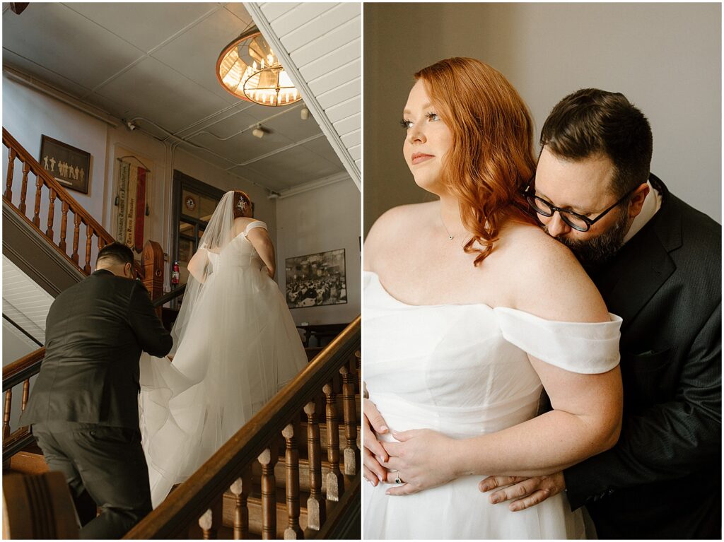 A groom carries the train of a bride's wedding dress up a staircase at Turner Hall.