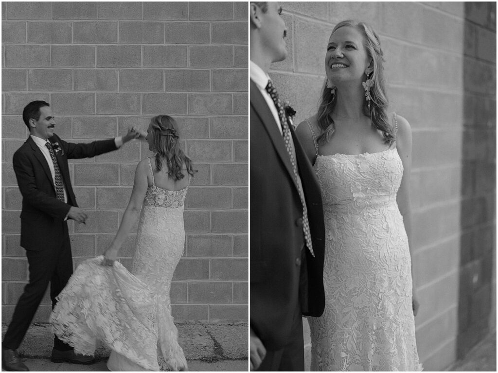 A groom twirls a bride on a Milwaukee sidewalk.