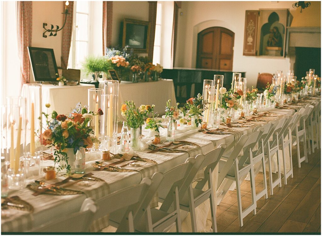 Inside Villa Terrace, a table is set with flowers for an elegant baby shower.