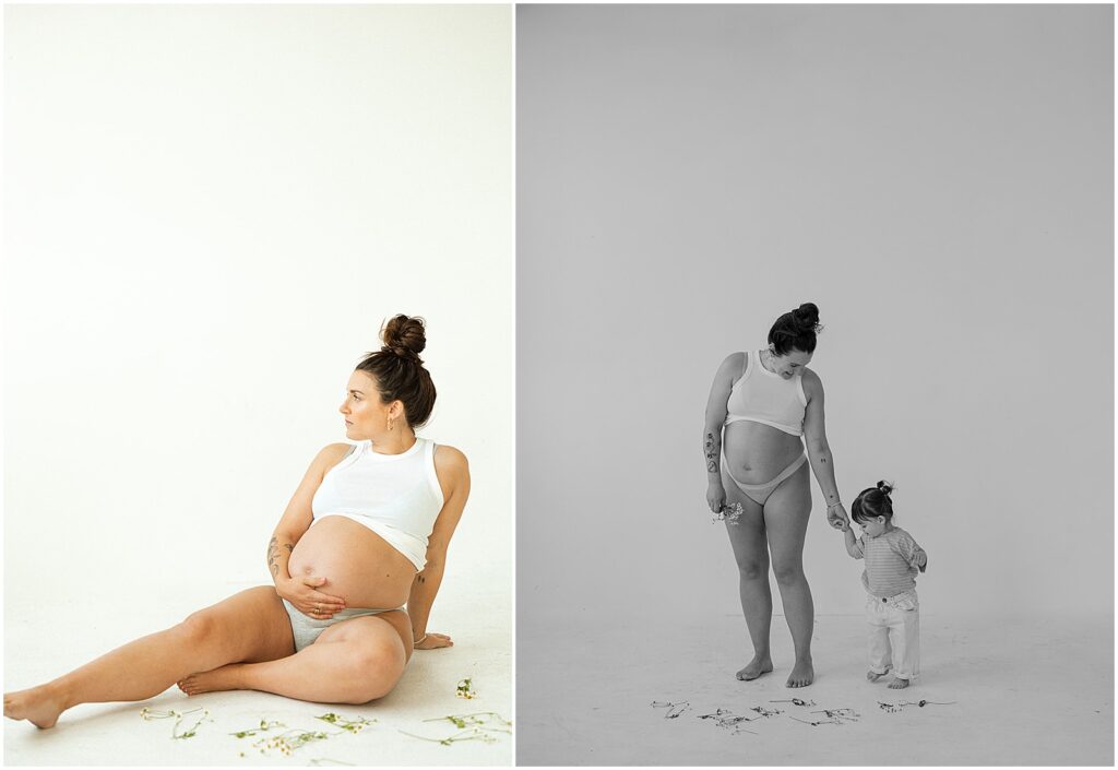 A pregnant woman and her toddler hold hands and pose for a Milwaukee family photographer.