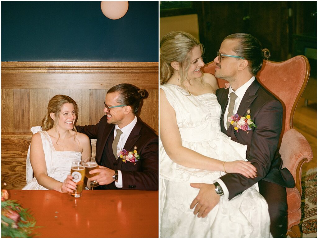 A bride sits on a groom's lap in a Milwaukee wedding venue.