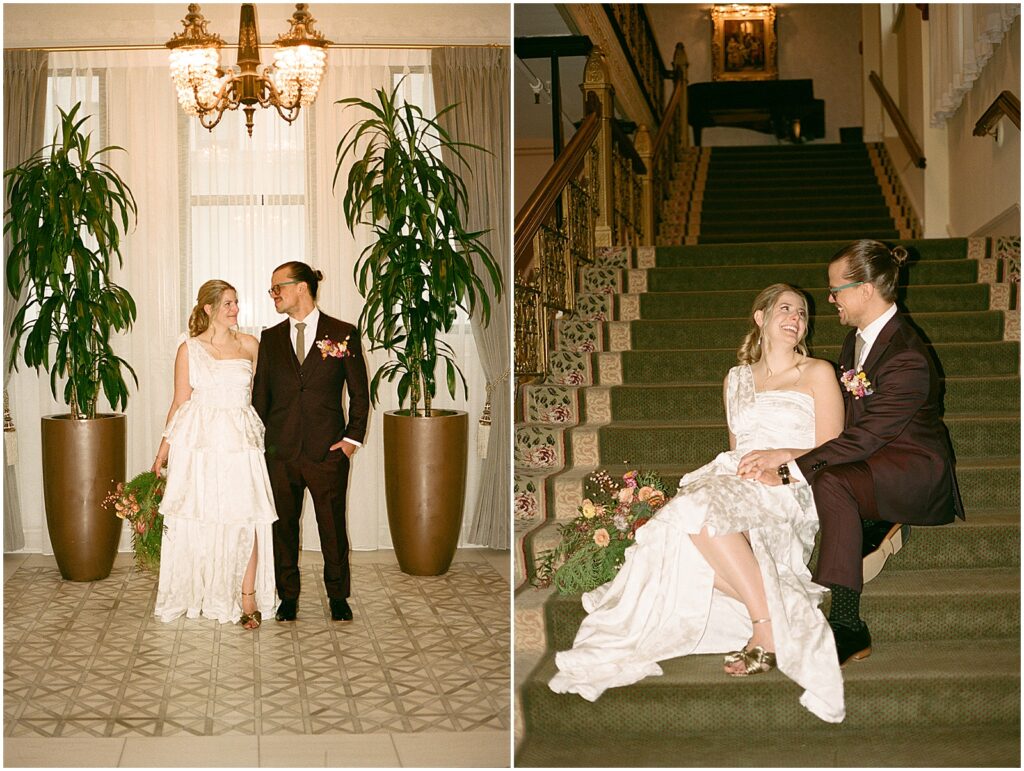 A Milwaukee bride and groom sit on a carpeted staircase in the Pfister Hotel.