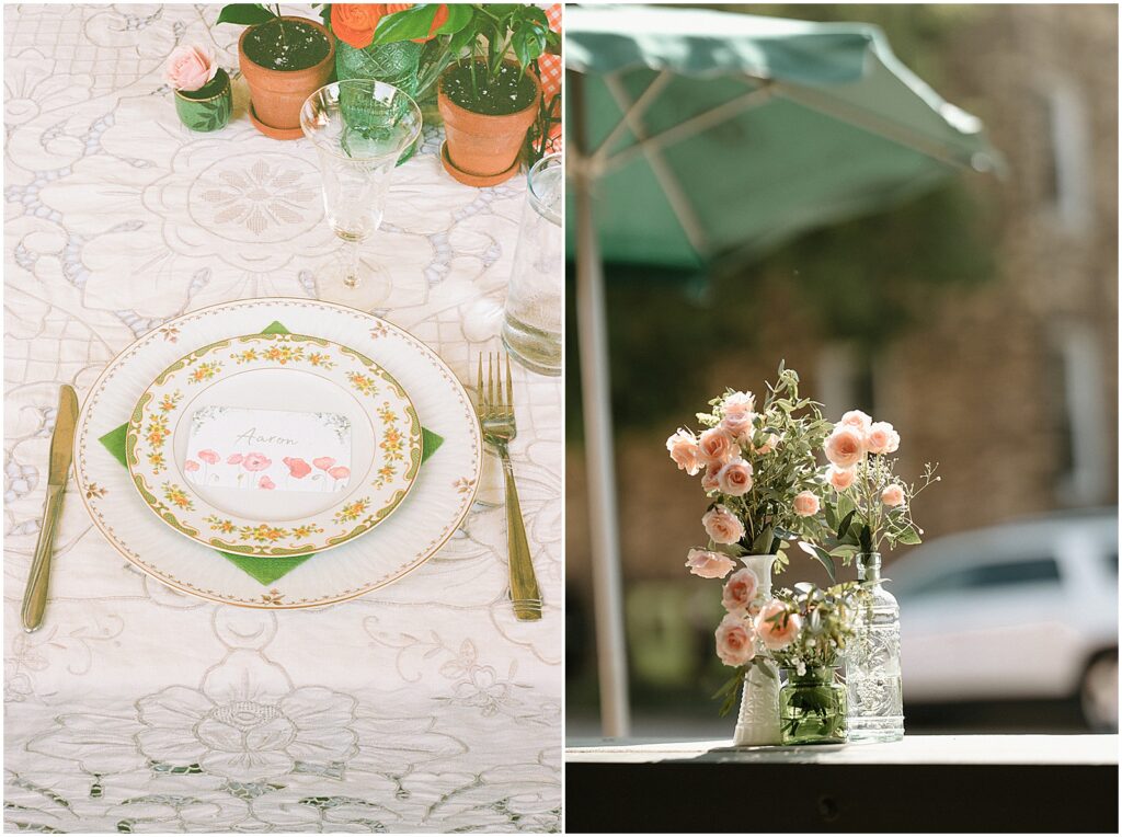 Vintage plates and pink florals decorate a sweetheart table at an Enlightened Brewing Company wedding.