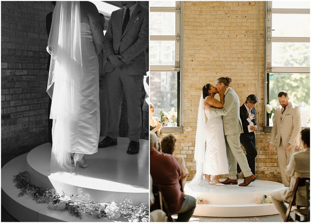 A bride and groom kiss at the end of their wedding ceremony.