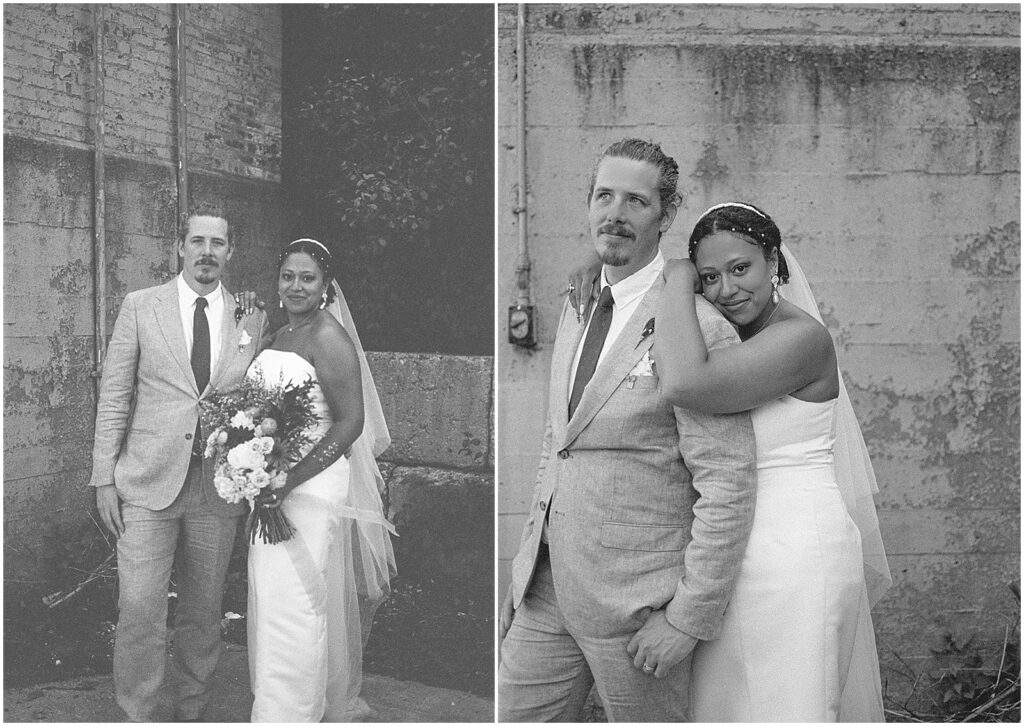 A bride leans on a groom in front of Enlightened Brewing Company.