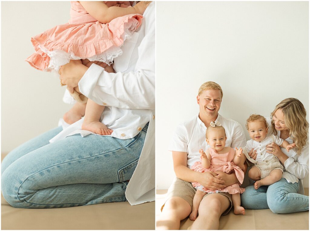 A mother and father sit with their twin babies in a Milwaukee photography studio.