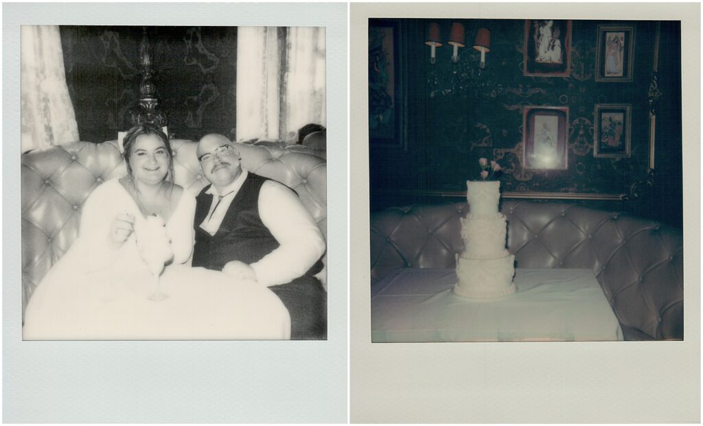 A bride and groom sit side by side at a table inside Hobnob Restaurant.