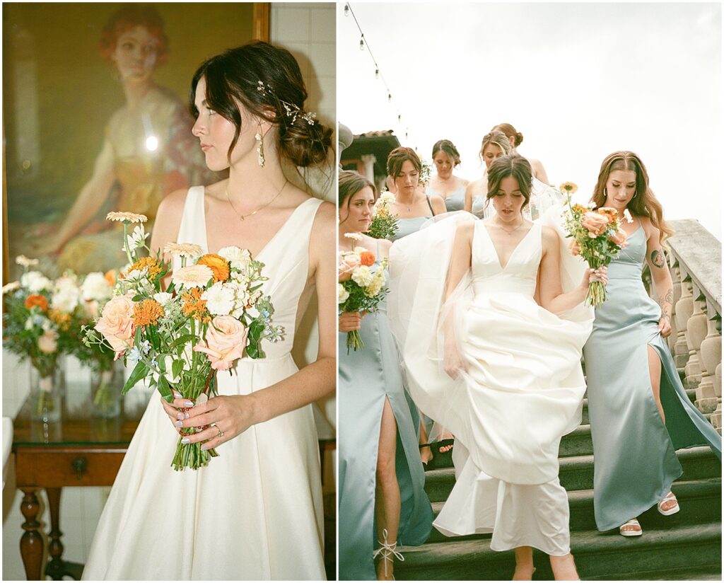 Women in blue bridesmaid dresses carry a bride's train as they walk down stone stairs at a Villa Terrace wedding.