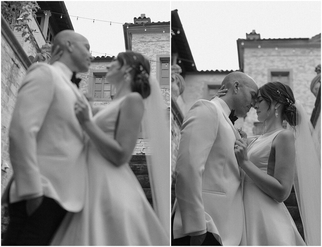 A bride and groom pose for editorial wedding photos on a terrace staircase at Villa Terrace Milwaukee.