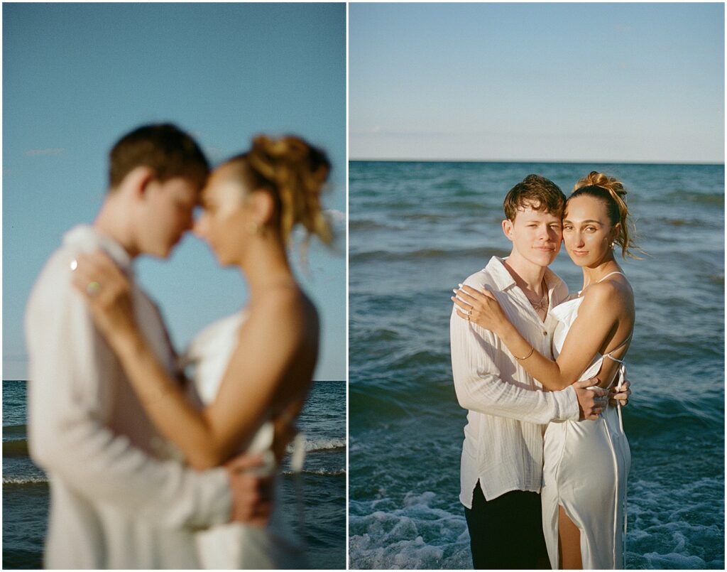 A bride and groom touch foreheads with Lake Michigan in the background of their elopement.