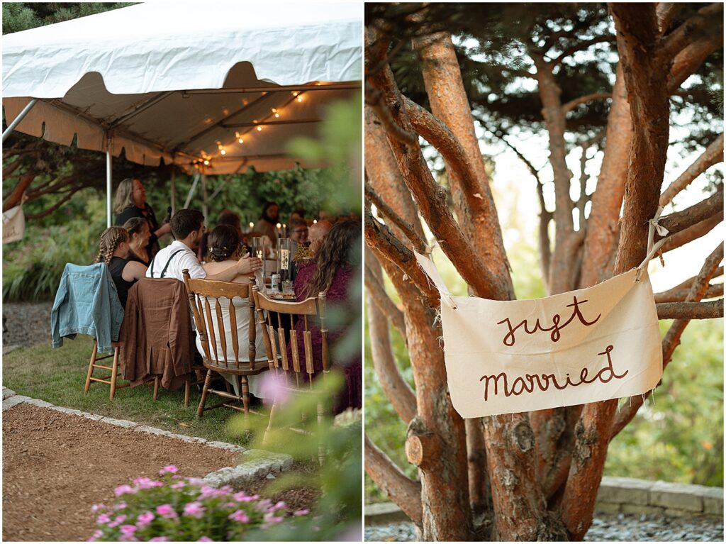 Wedding guests sit under a tent at a backyard wedding reception.