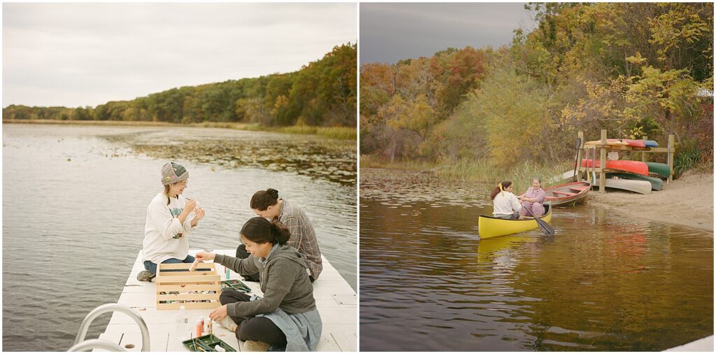 People climb into boats on a lakeshore at Camp Wandawega.