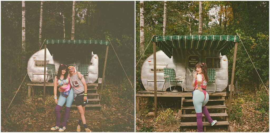 People pose in front of cabins at Camp Wandawega.