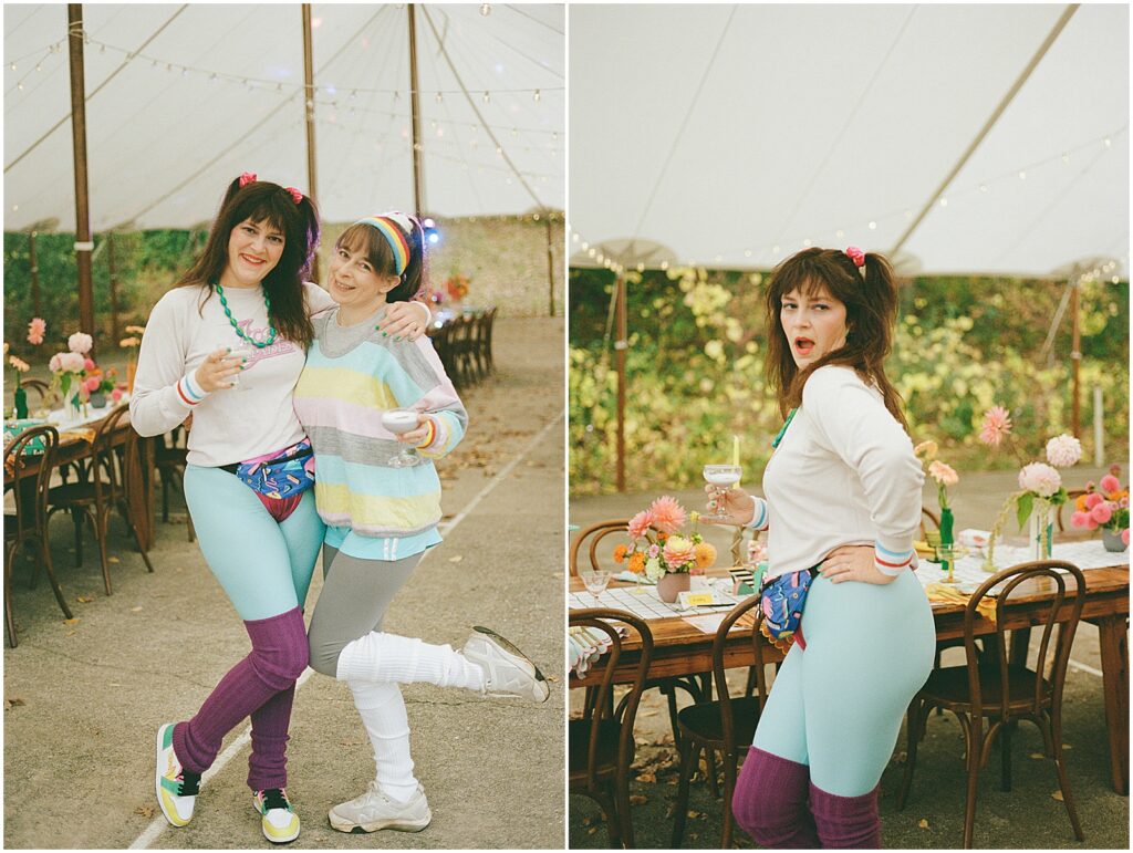 A woman in an 80s costume poses in an event tent.